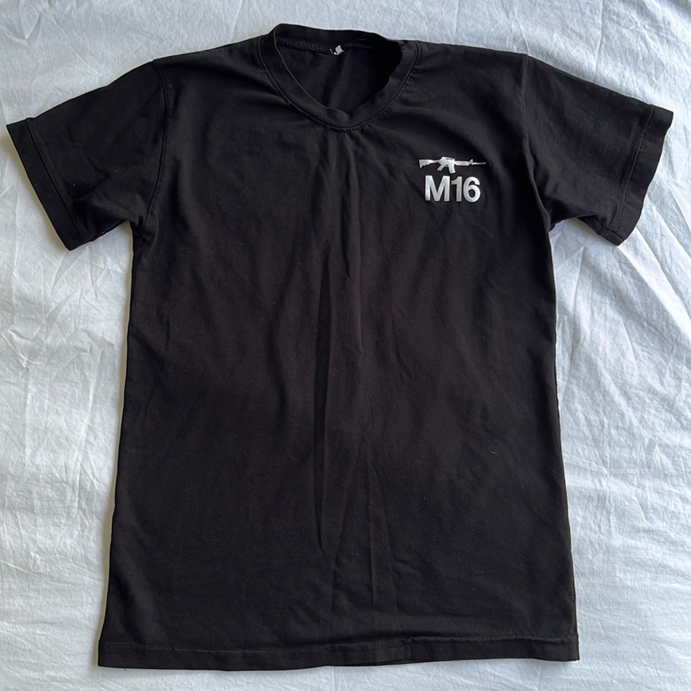 Boys black tee shirt .